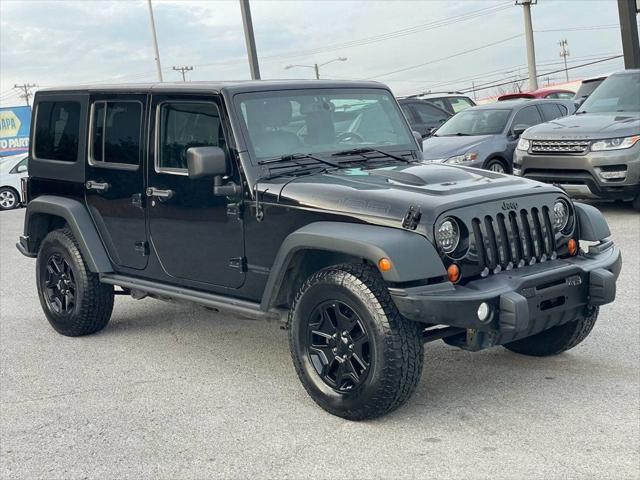 used 2013 Jeep Wrangler Unlimited car, priced at $14,995