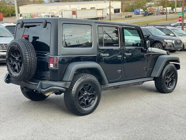 used 2013 Jeep Wrangler Unlimited car, priced at $14,995