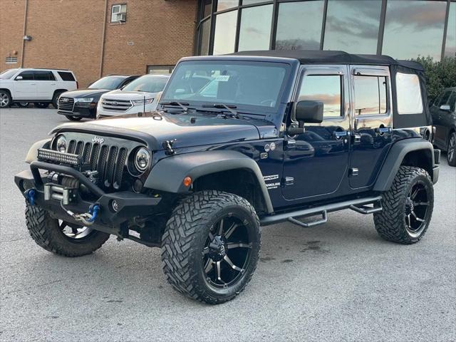 used 2013 Jeep Wrangler Unlimited car, priced at $13,495