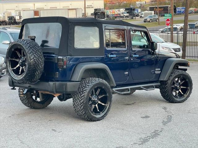 used 2013 Jeep Wrangler Unlimited car, priced at $13,495