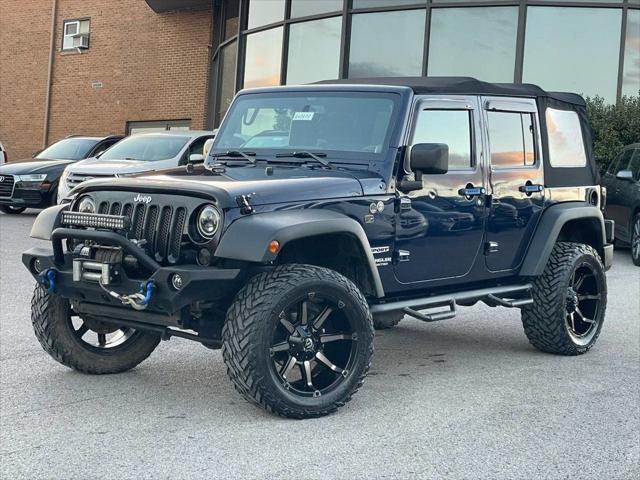 used 2013 Jeep Wrangler Unlimited car, priced at $13,495