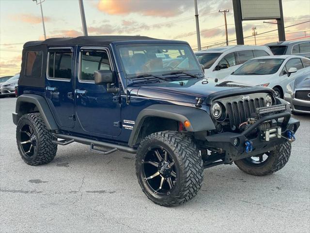 used 2013 Jeep Wrangler Unlimited car, priced at $13,495