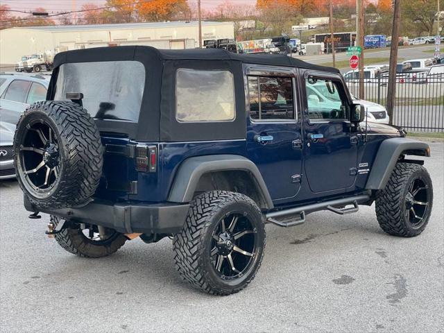 used 2013 Jeep Wrangler Unlimited car, priced at $13,495