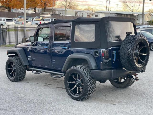 used 2013 Jeep Wrangler Unlimited car, priced at $13,495