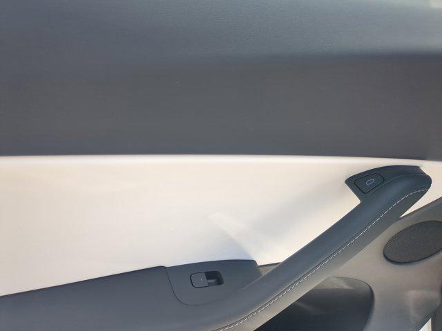 used 2022 Tesla Model Y car, priced at $29,075