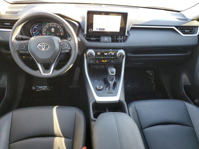 used 2024 Toyota RAV4 Hybrid car, priced at $35,000