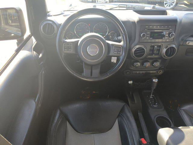 used 2015 Jeep Wrangler Unlimited car, priced at $18,172