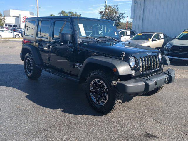 used 2015 Jeep Wrangler Unlimited car, priced at $18,172