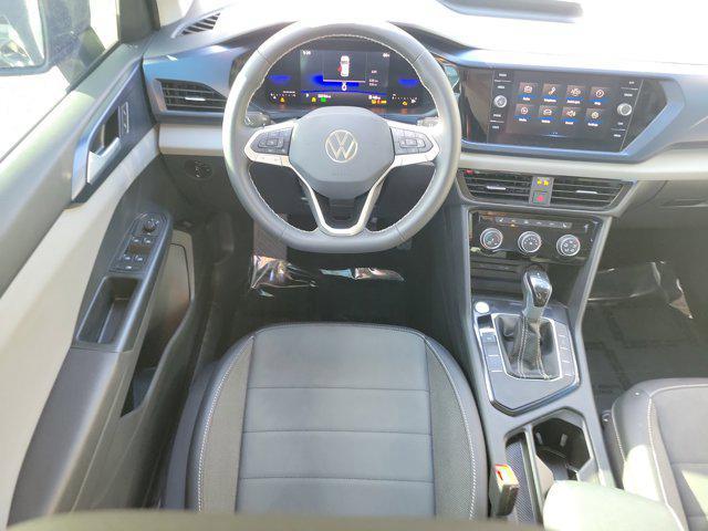 used 2023 Volkswagen Taos car, priced at $18,284
