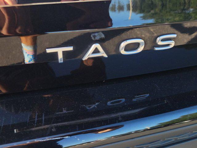 used 2023 Volkswagen Taos car, priced at $18,284