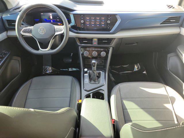 used 2023 Volkswagen Taos car, priced at $18,284