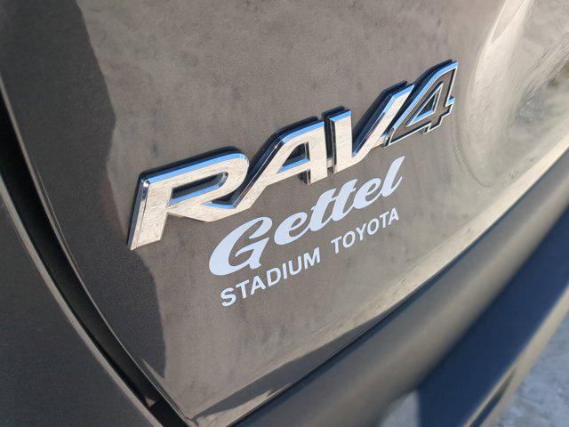 used 2024 Toyota RAV4 Hybrid car, priced at $34,000