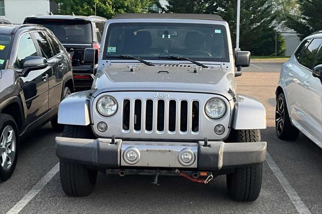 used 2016 Jeep Wrangler Unlimited car, priced at $22,756