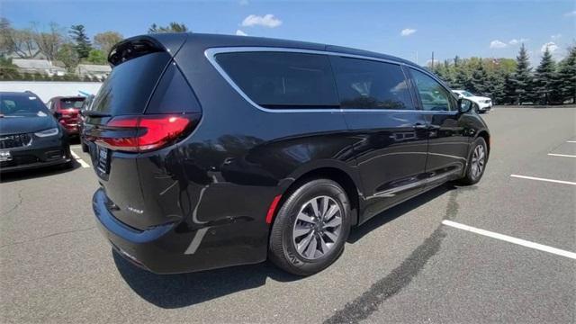 used 2023 Chrysler Pacifica Hybrid car, priced at $55,000
