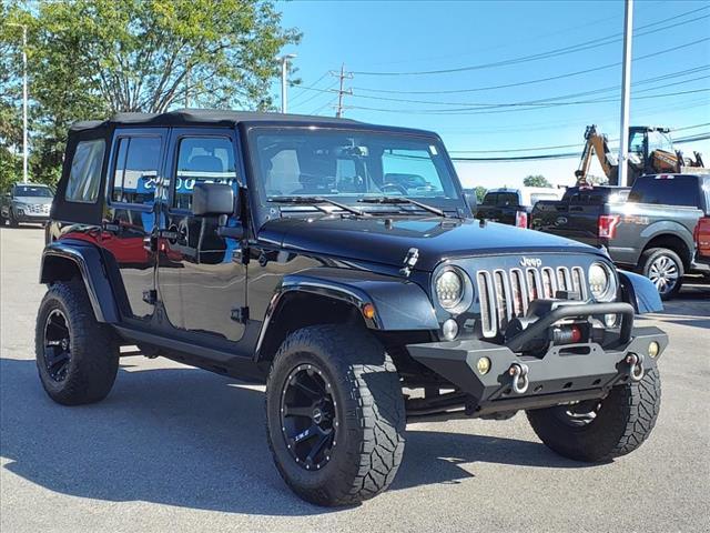 used 2016 Jeep Wrangler Unlimited car, priced at $18,611