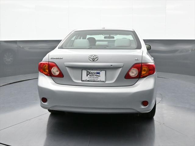 used 2010 Toyota Corolla car, priced at $9,000