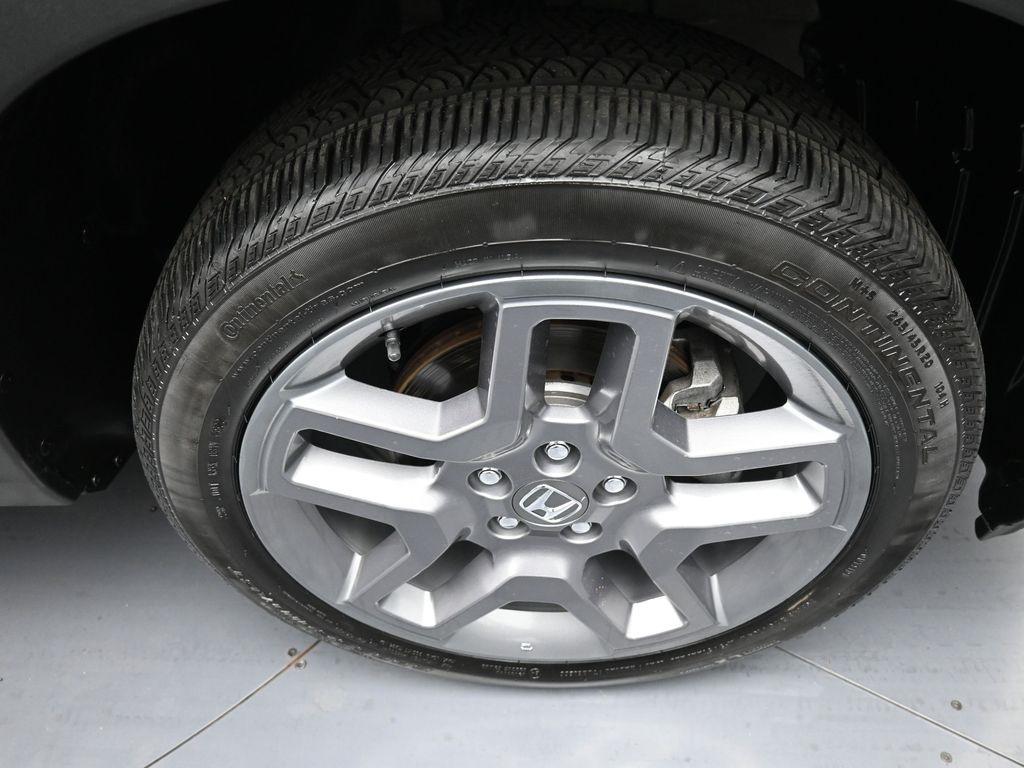 used 2023 Honda Passport car, priced at $32,000