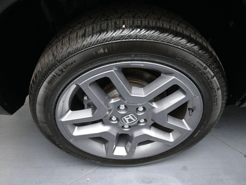 used 2023 Honda Passport car, priced at $32,000