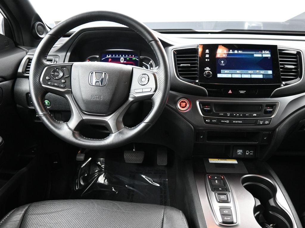 used 2023 Honda Passport car, priced at $32,000