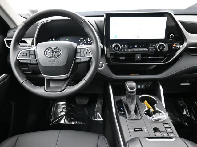 used 2024 Toyota Highlander Hybrid car, priced at $49,500