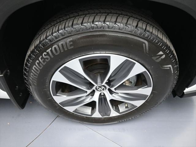 used 2024 Toyota Highlander Hybrid car, priced at $49,500