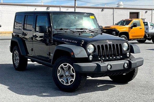 used 2014 Jeep Wrangler Unlimited car, priced at $19,223