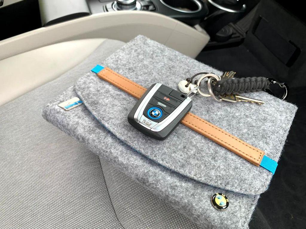 used 2015 BMW i3 car, priced at $8,900