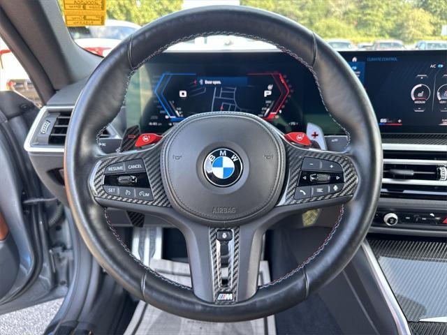 used 2024 BMW M4 car, priced at $75,290