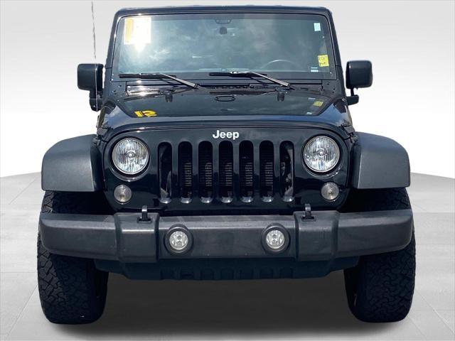 used 2015 Jeep Wrangler Unlimited car, priced at $12,090