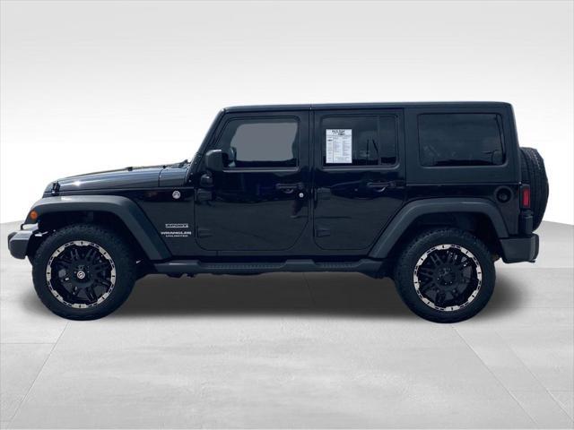 used 2015 Jeep Wrangler Unlimited car, priced at $12,090