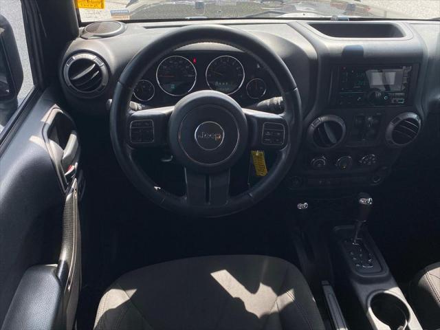 used 2015 Jeep Wrangler Unlimited car, priced at $12,090