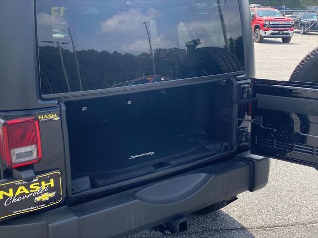 used 2015 Jeep Wrangler Unlimited car, priced at $12,090