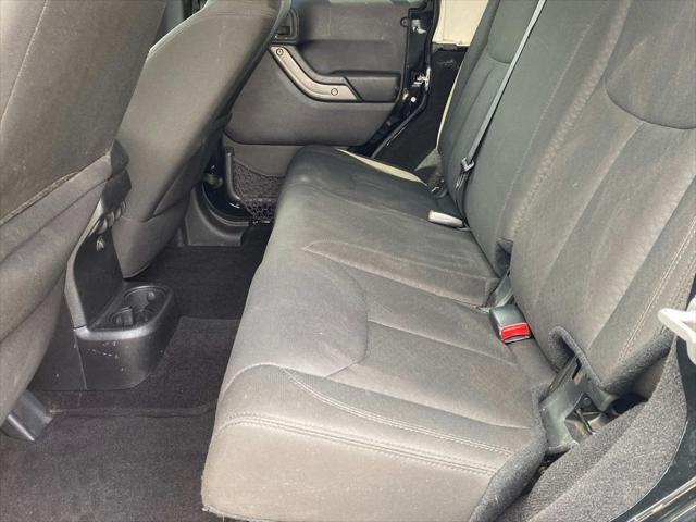 used 2015 Jeep Wrangler Unlimited car, priced at $12,090