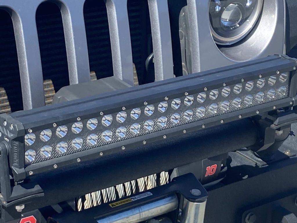 used 2014 Jeep Wrangler Unlimited car, priced at $18,290