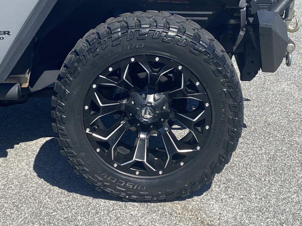 used 2014 Jeep Wrangler Unlimited car, priced at $18,290