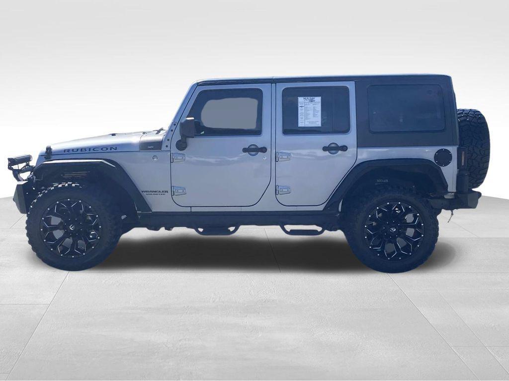 used 2014 Jeep Wrangler Unlimited car, priced at $18,290