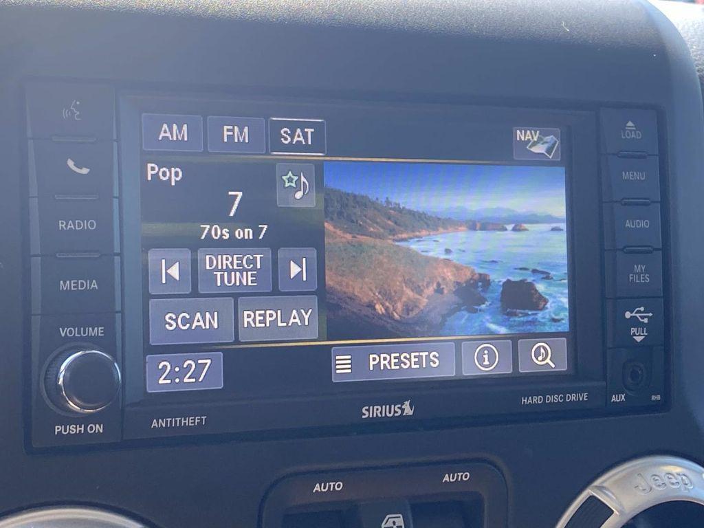 used 2014 Jeep Wrangler Unlimited car, priced at $18,290