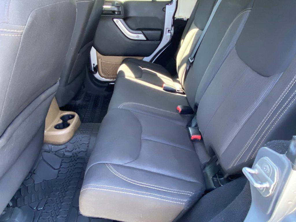 used 2014 Jeep Wrangler Unlimited car, priced at $18,290