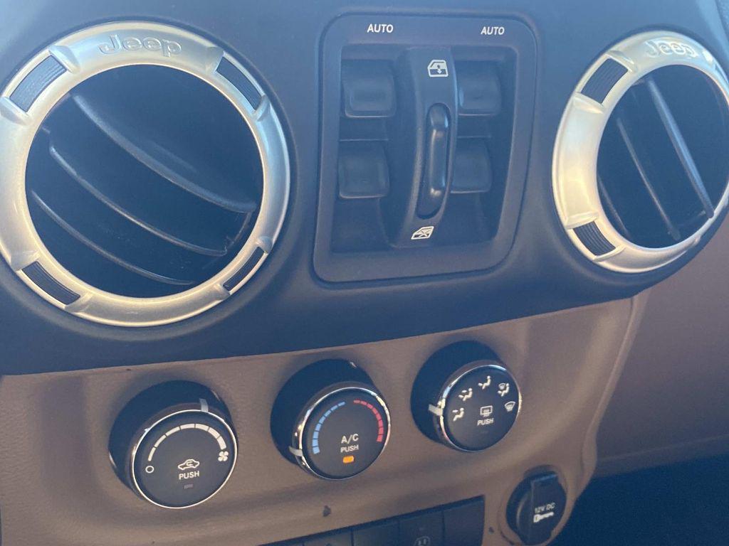 used 2014 Jeep Wrangler Unlimited car, priced at $18,290