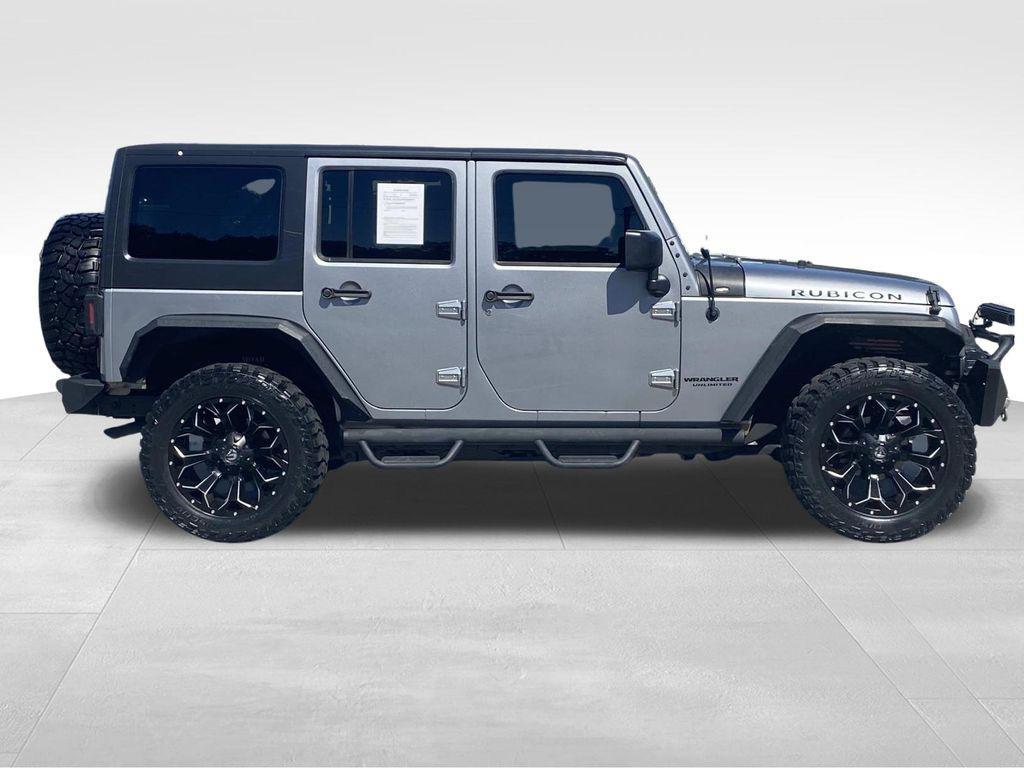 used 2014 Jeep Wrangler Unlimited car, priced at $18,290