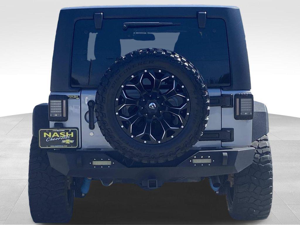 used 2014 Jeep Wrangler Unlimited car, priced at $18,290