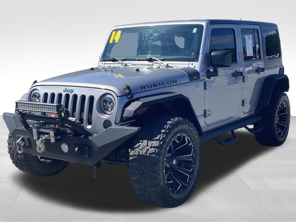 used 2014 Jeep Wrangler Unlimited car, priced at $18,290