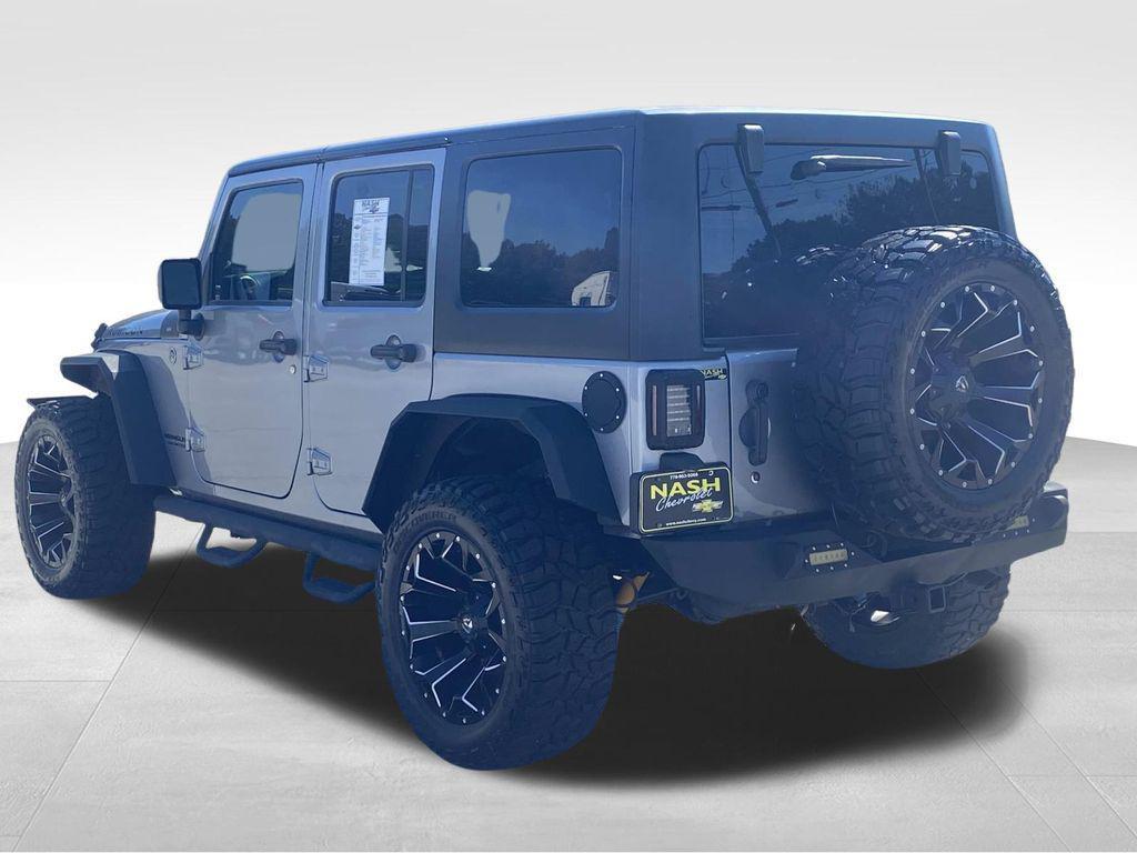 used 2014 Jeep Wrangler Unlimited car, priced at $18,290
