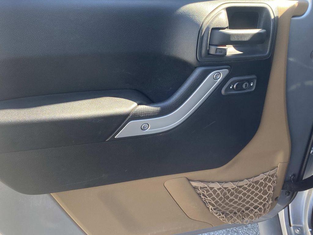 used 2014 Jeep Wrangler Unlimited car, priced at $18,290