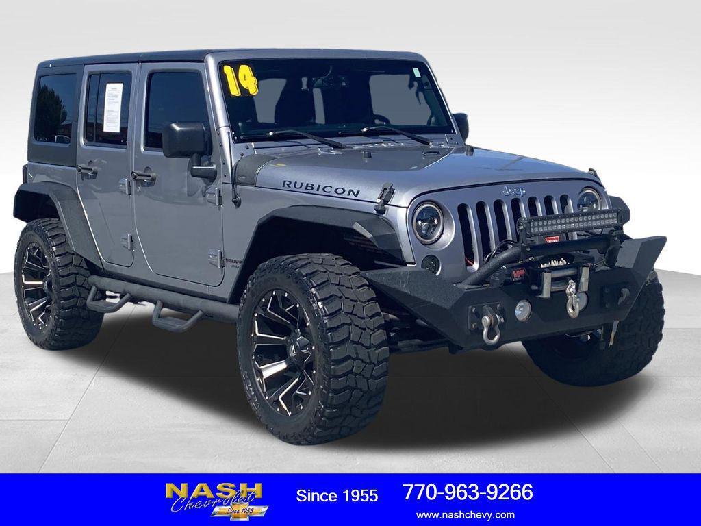 used 2014 Jeep Wrangler Unlimited car, priced at $18,490