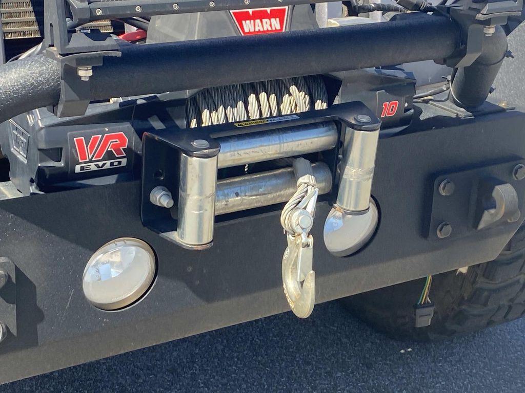 used 2014 Jeep Wrangler Unlimited car, priced at $18,290