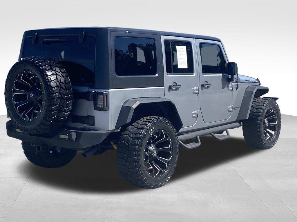 used 2014 Jeep Wrangler Unlimited car, priced at $18,290