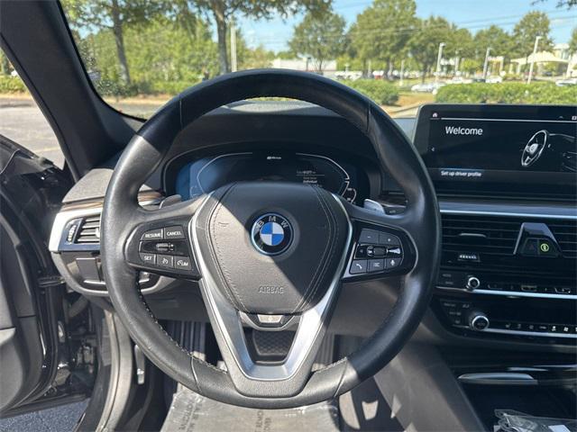 used 2023 BMW 530e car, priced at $28,491