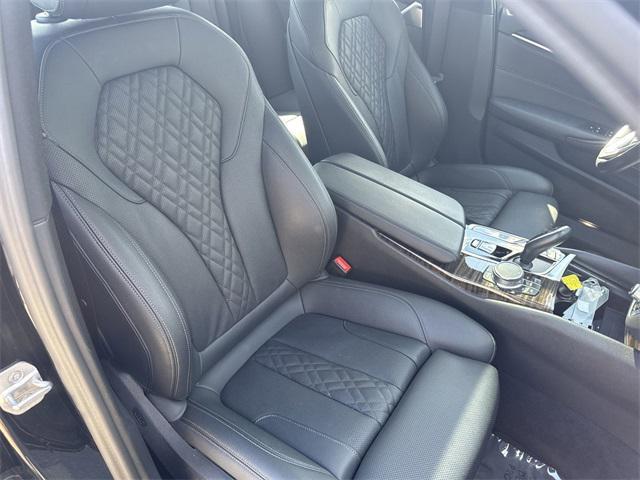 used 2023 BMW 530e car, priced at $28,491