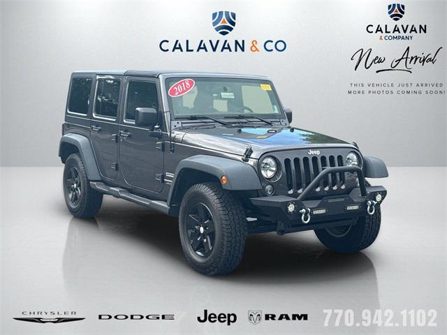 used 2018 Jeep Wrangler JK Unlimited car, priced at $17,491